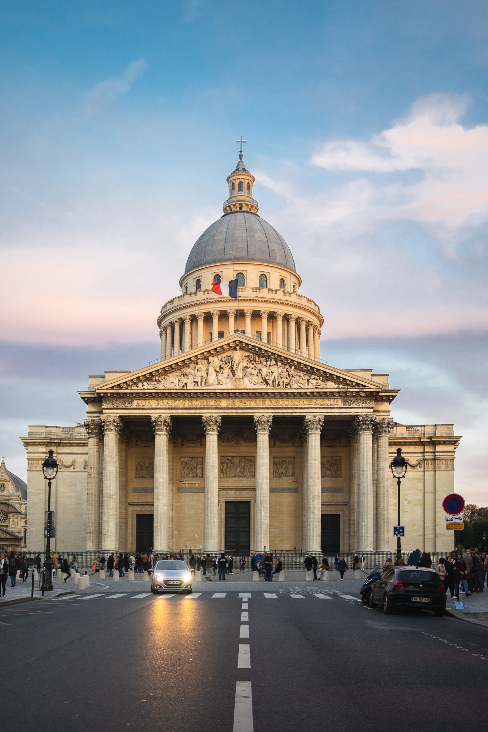 Pantheon Golfette-Parissienne surrounded by people cloudy sky sunset paris france-scaled