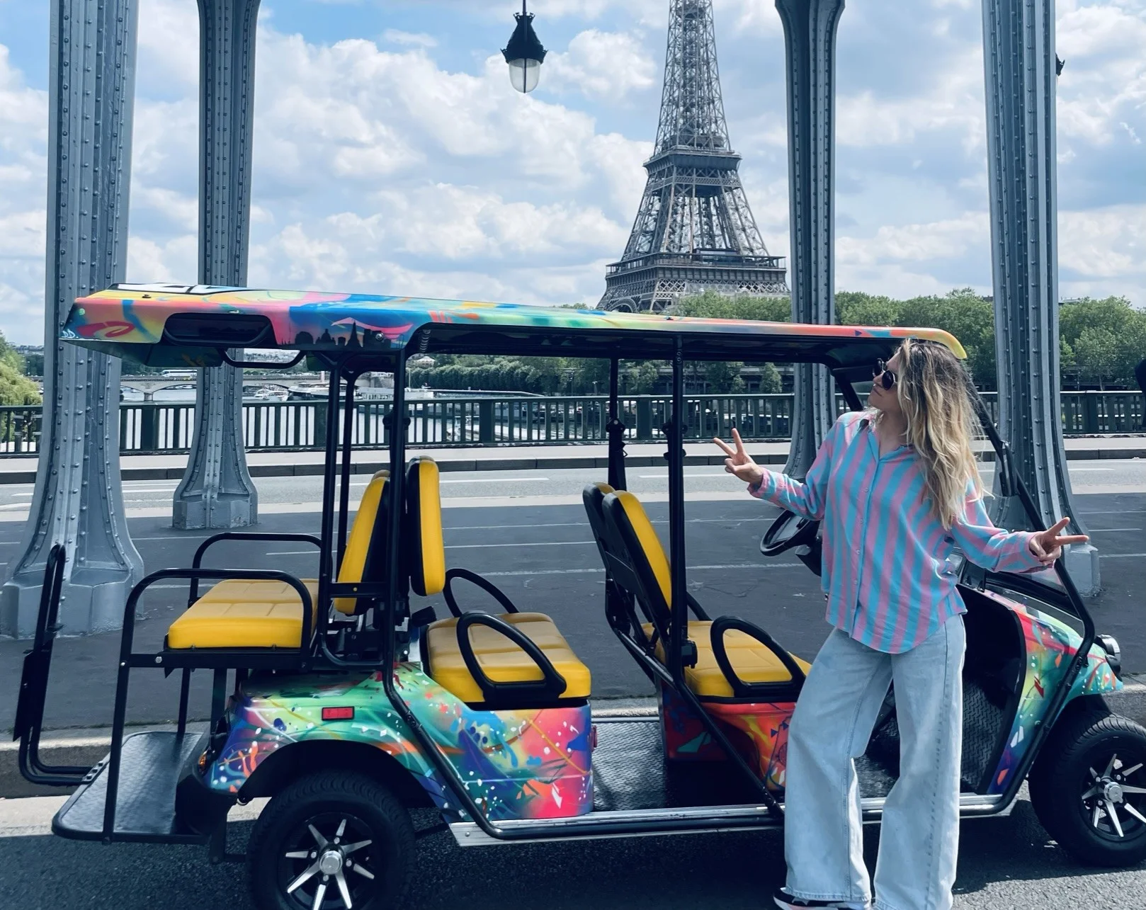 Sara, the Parisian guide, with the street art-designed golf cart.